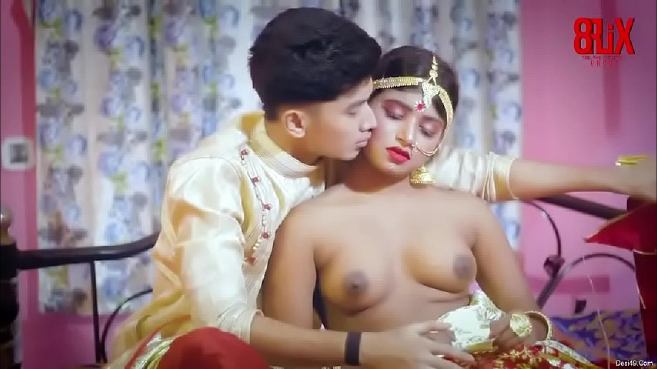 Horny couple enjoying erotic sex on wedding night pic